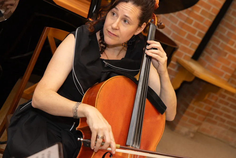 A cellist mid-phrase, 2026